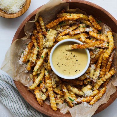 Crispy Organic Crinkle Cut Fries with Garlic, Parmesan, and Homemade Pistachio Basil Pesto