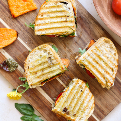 Caprese Panini with Organic Sweet Potato Toasts, Mozzarella, Tomato, Basil Pesto, and Balsamic