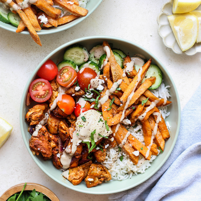 High-Protein Chicken Shawarma Rice Bowls with Organic Sweet Potato Fries and Garlic Tahini Sauce