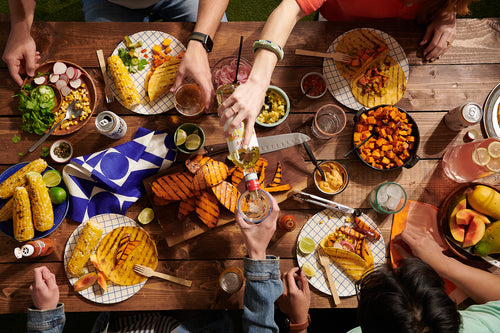 An assortment of meals using the seed oil free products from Roots Farm Fresh on a table.